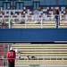 A pedestrian walks on top of a structure at the Michigan International Speedway in Brooklyn during the MHSAA LP Cross Country Championships on Saturday. Daniel Brenner I AnnArbor.com